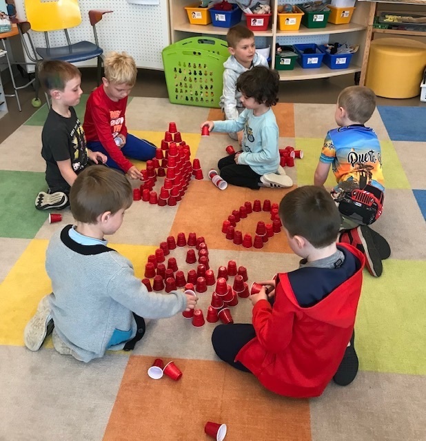 students building with blocks