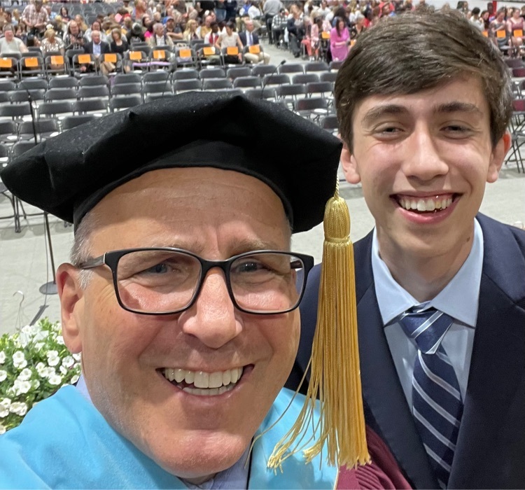 supr and student at graduation